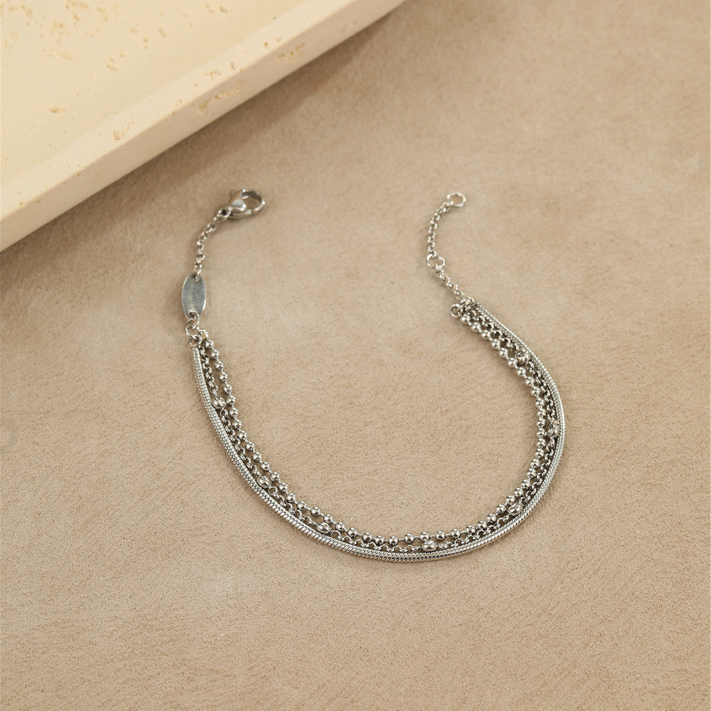 High-end, multi-layered bracelet with embedded zircon stones that can be layered together.