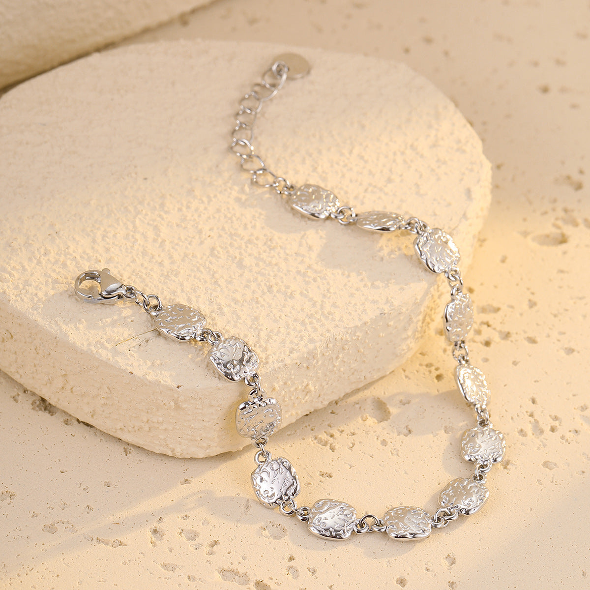 Square-shaped hammered gold bracelet