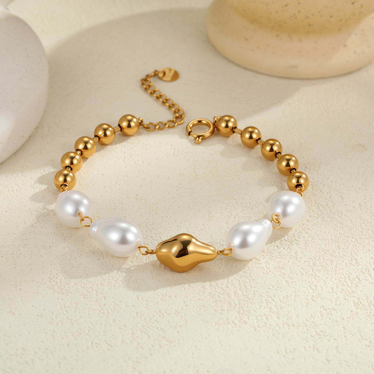 Heart-shaped, diamond-embellished, faux Baroque pearl stainless steel bracelet