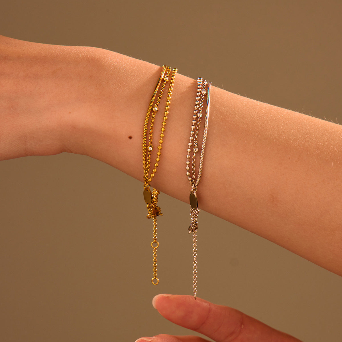 High-end, multi-layered bracelet with embedded zircon stones that can be layered together.