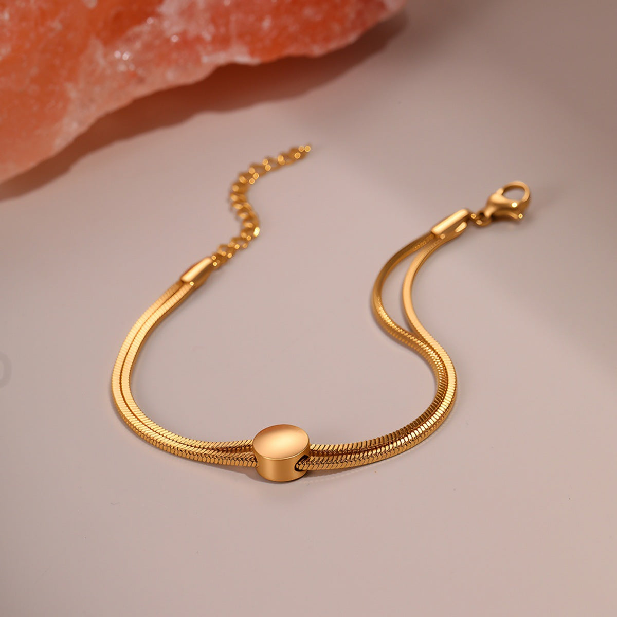 Titanium steel bracelet with a 18K gold-plated snake chain