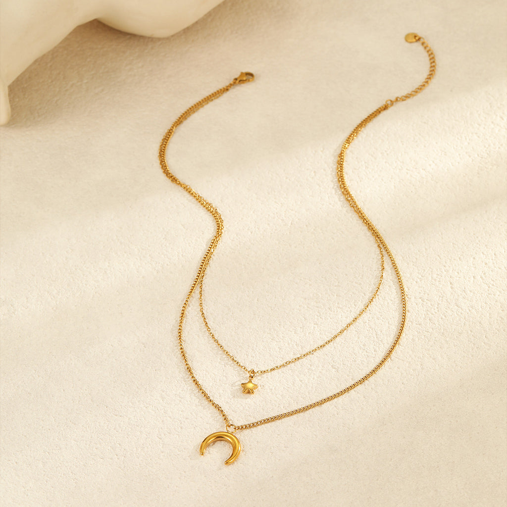 Retro-style necklace, gold-plated with a moon-shaped star motif made of titanium steel