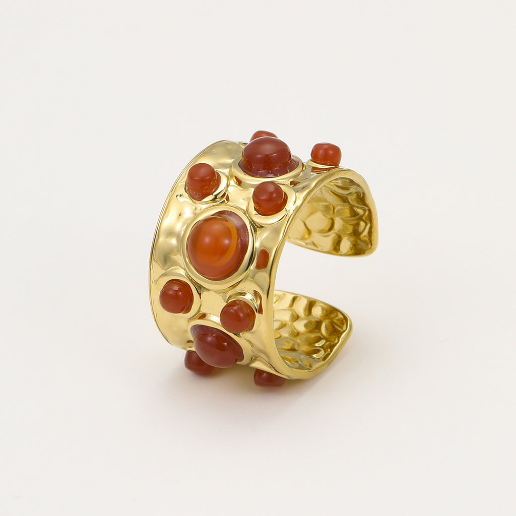 French court-style, multi-gemmed open-front ring