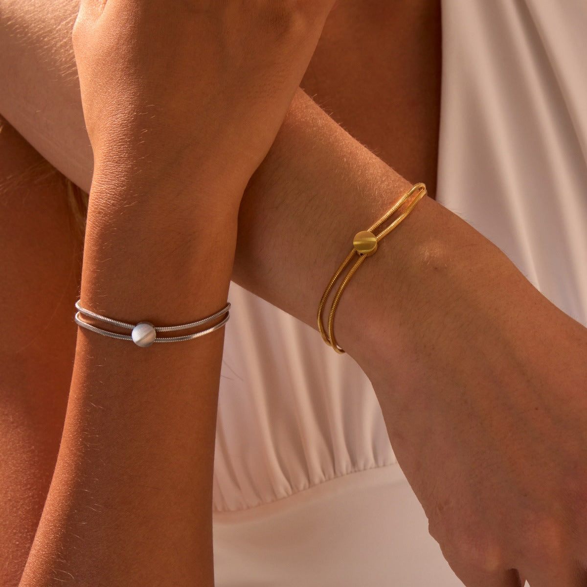 Titanium steel bracelet with a 18K gold-plated snake chain