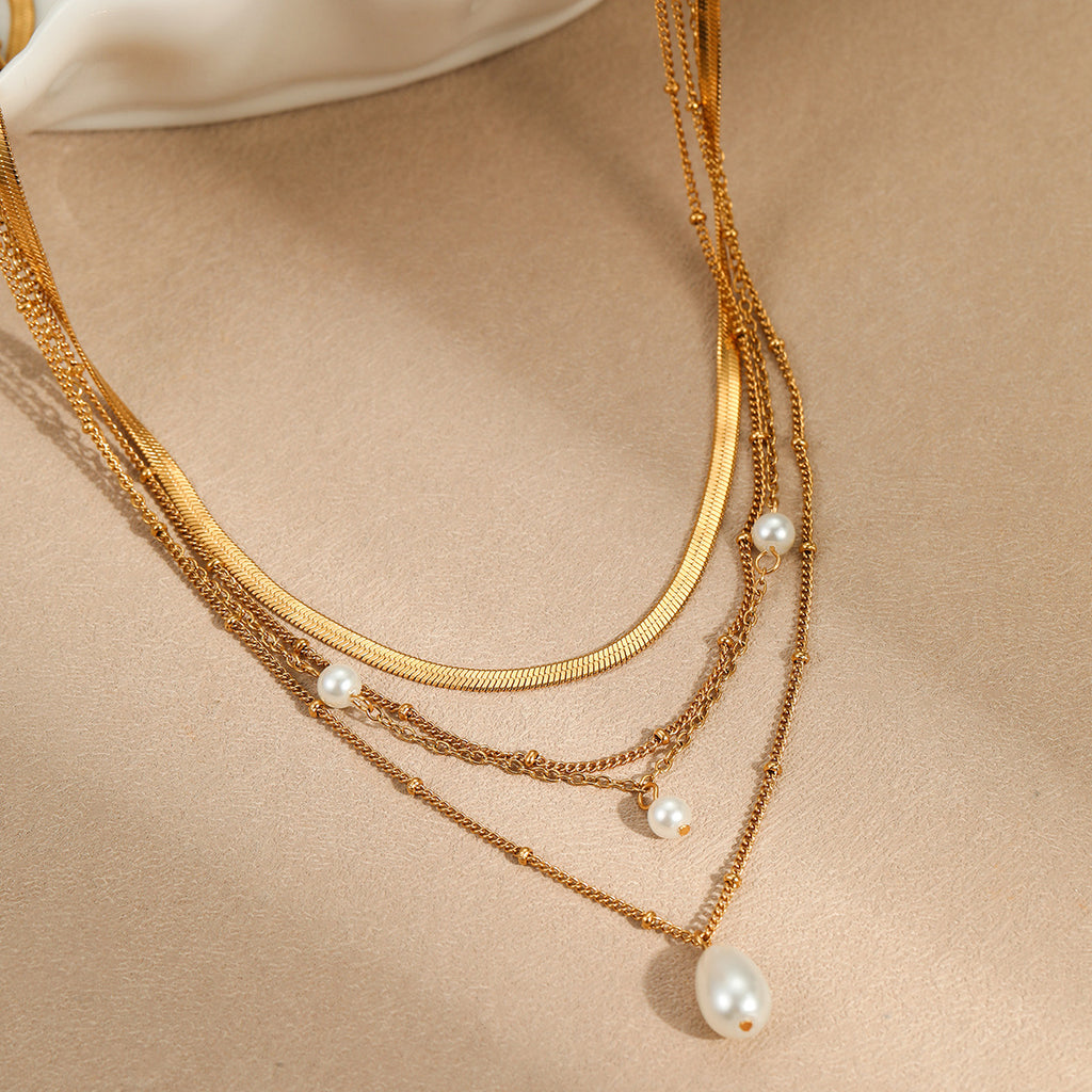 Waterdrop-inspired pearl-like tassel pendant layered necklace