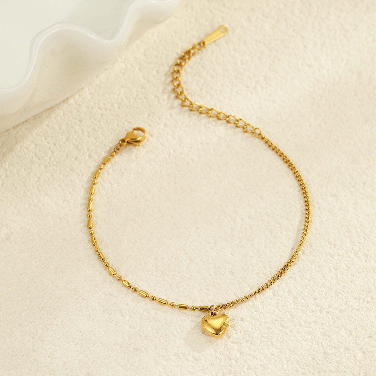 Sophisticated, heart-shaped bracelet that is simple and versatile for any occasion.