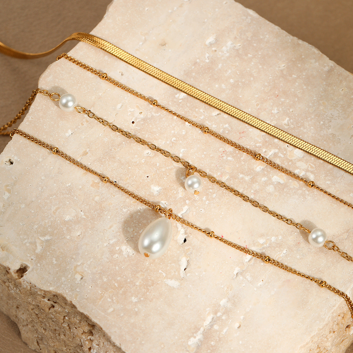 Waterdrop-inspired pearl-like tassel pendant layered necklace