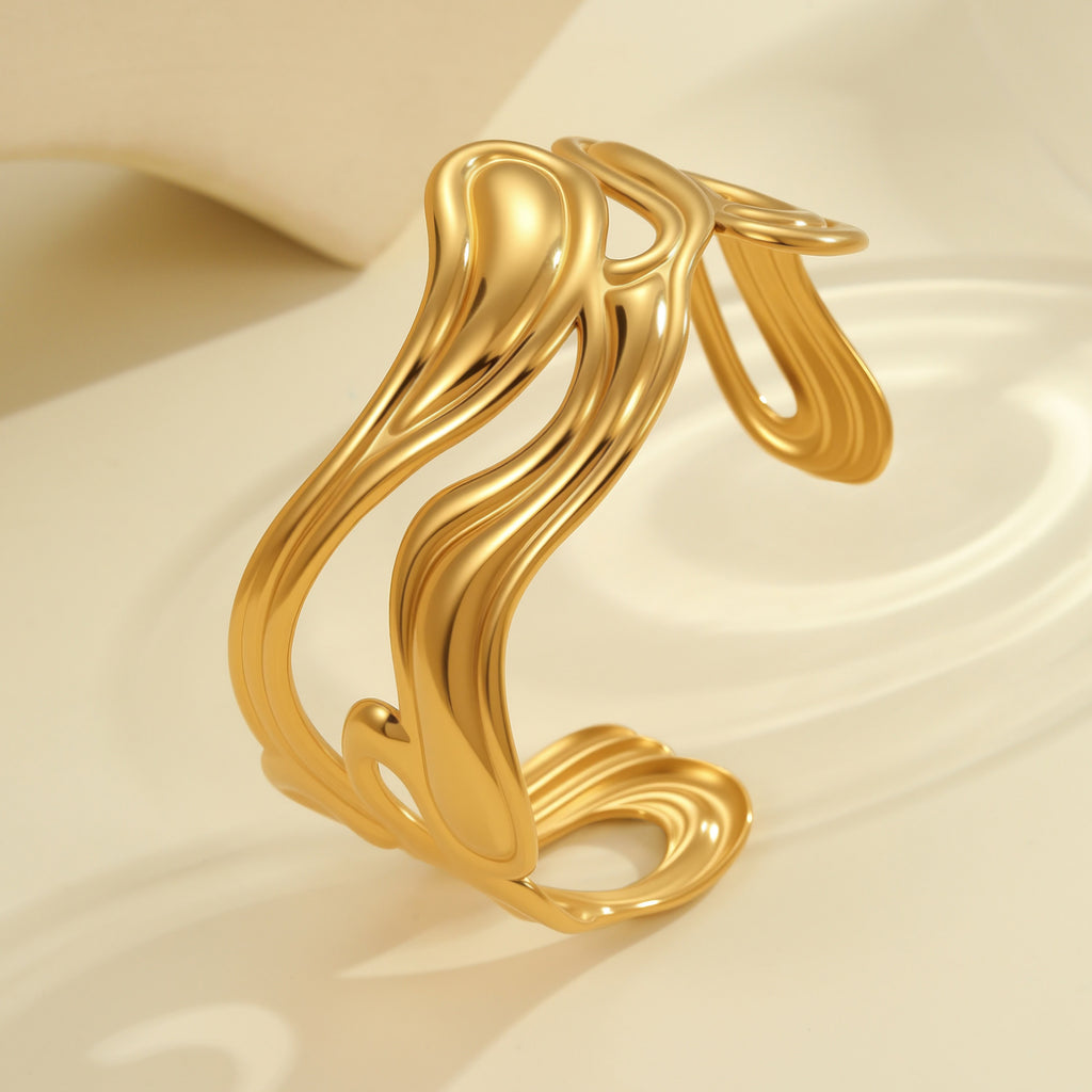 Exaggeratedly designed, 18K gold-plated, open-faced bracelet